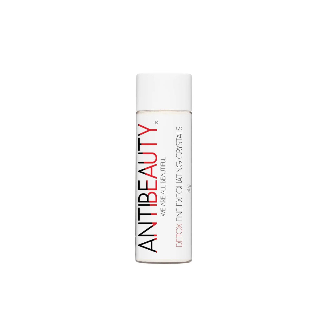 AntiBeauty Detox Fine Exfoliating Crystals with product label on display against a white background.