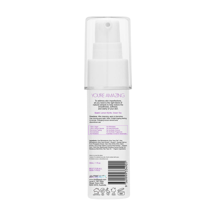 Back label of AntiBeauty Potent Spot Perfector bottle on white background, featuring product details and ingredients list. Award logo visible.