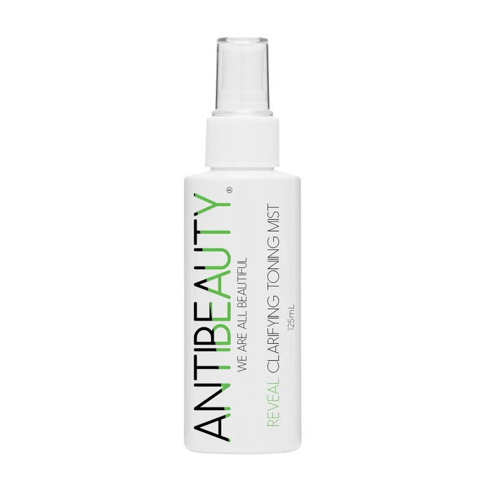 AntiBeauty Reveal Clarifying Toning Mist with product label on display against a white background.