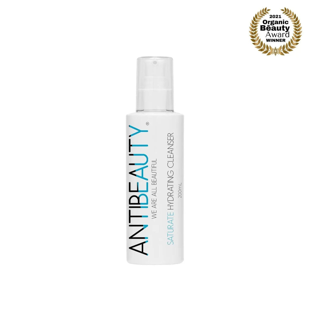 AntiBeauty Saturate Hydrating Cleanser with product label on display against a white background.