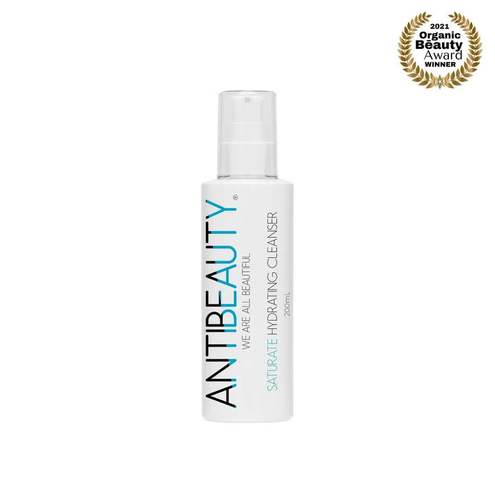 AntiBeauty Saturate Hydrating Cleanser with product label on display against a white background.