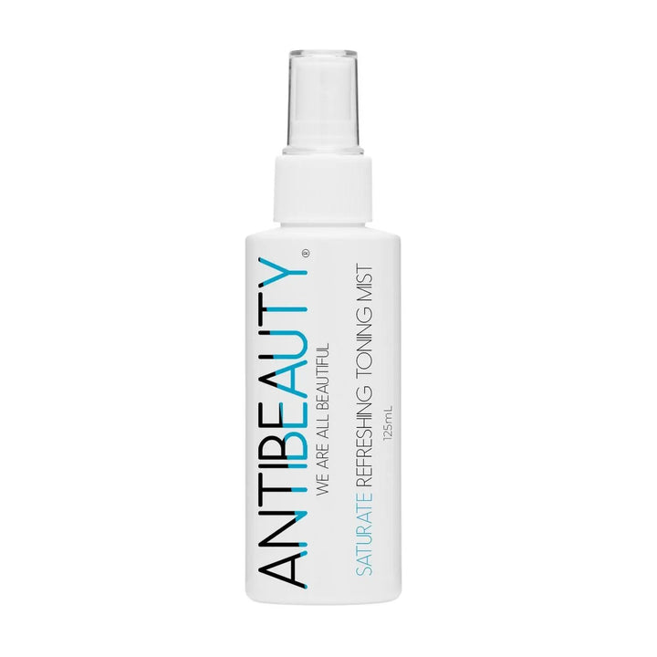 AntiBeauty Saturate Refreshing Toning Mist with product label on display against a white background.