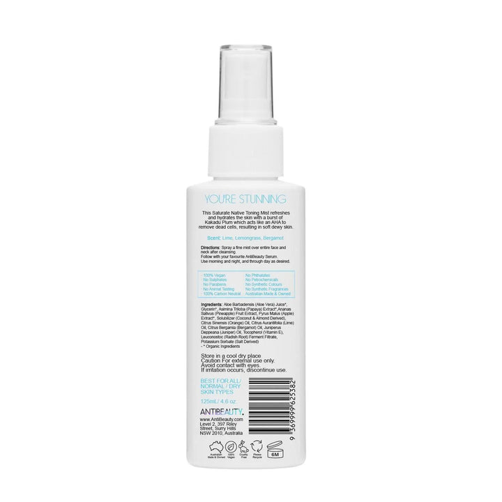 Back label of AntiBeauty Saturate Refreshing Toning Mist bottle on white background, featuring product details and ingredients list.