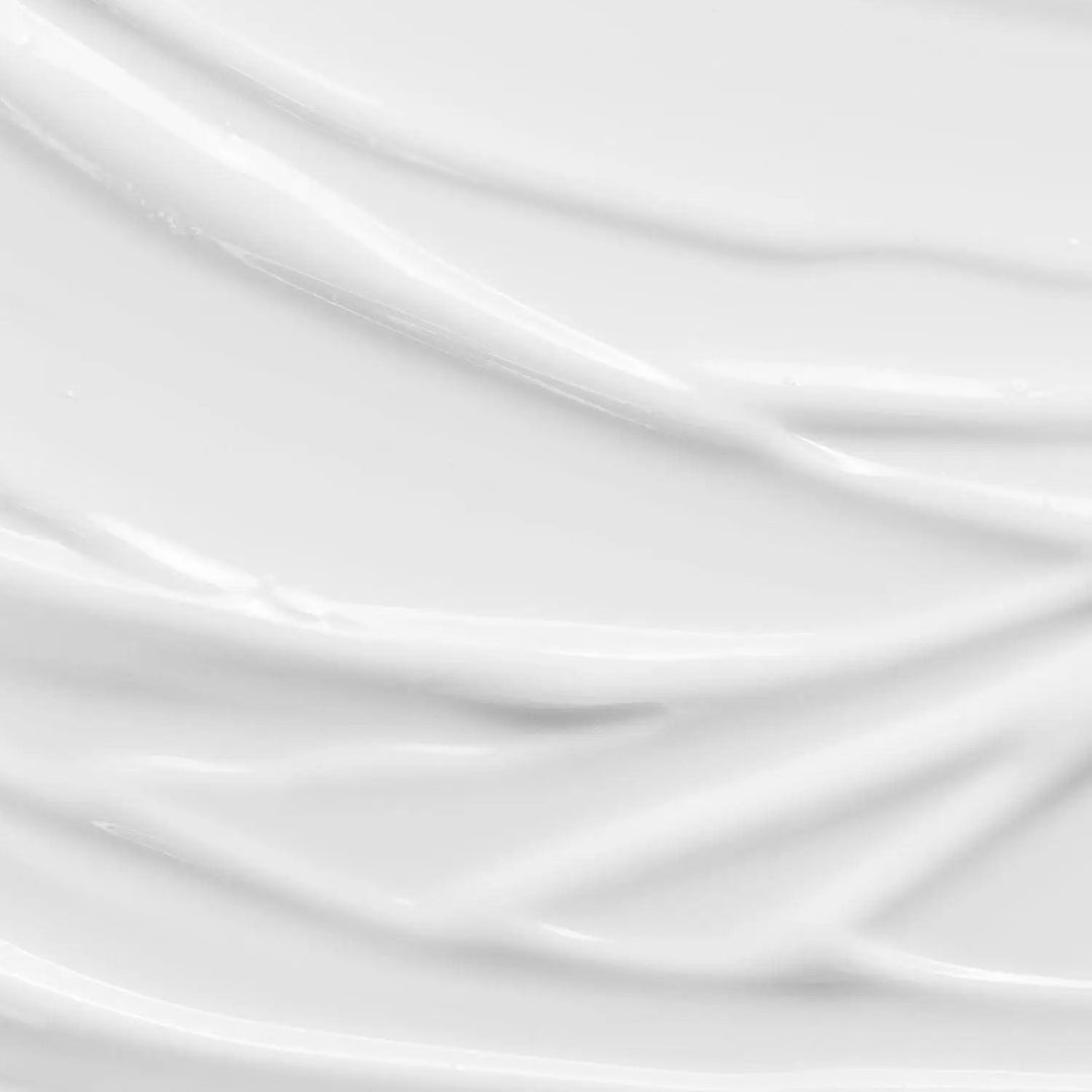 A swatch of the AntiBeauty Saturate Hydrating Cleanser, showing its milky texture and soothing properties for dry or normal skin.