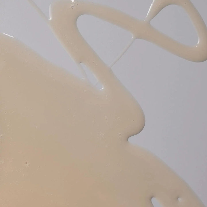 A swatch of the AntiBeauty Potent Vitamin C Serum, showing its light liquid texture, perfect for for Dry Skin, Ageing Skin, or Sundamaged Skin.